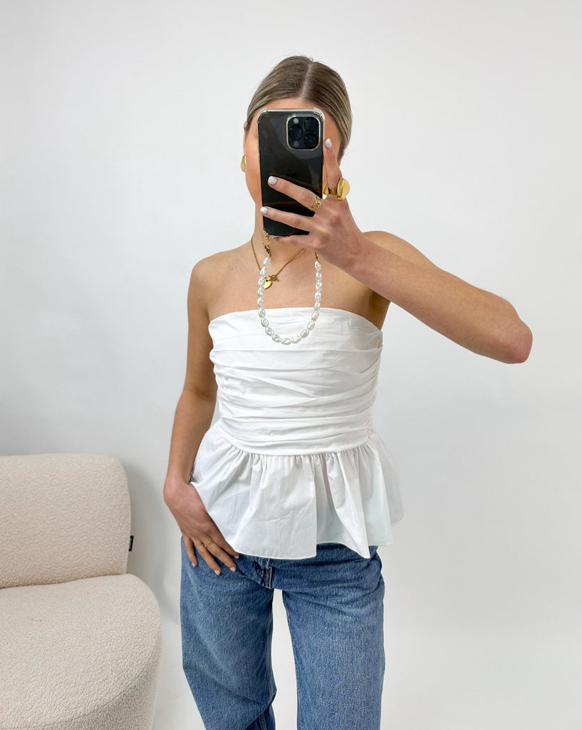 Witte katoenen peplum top