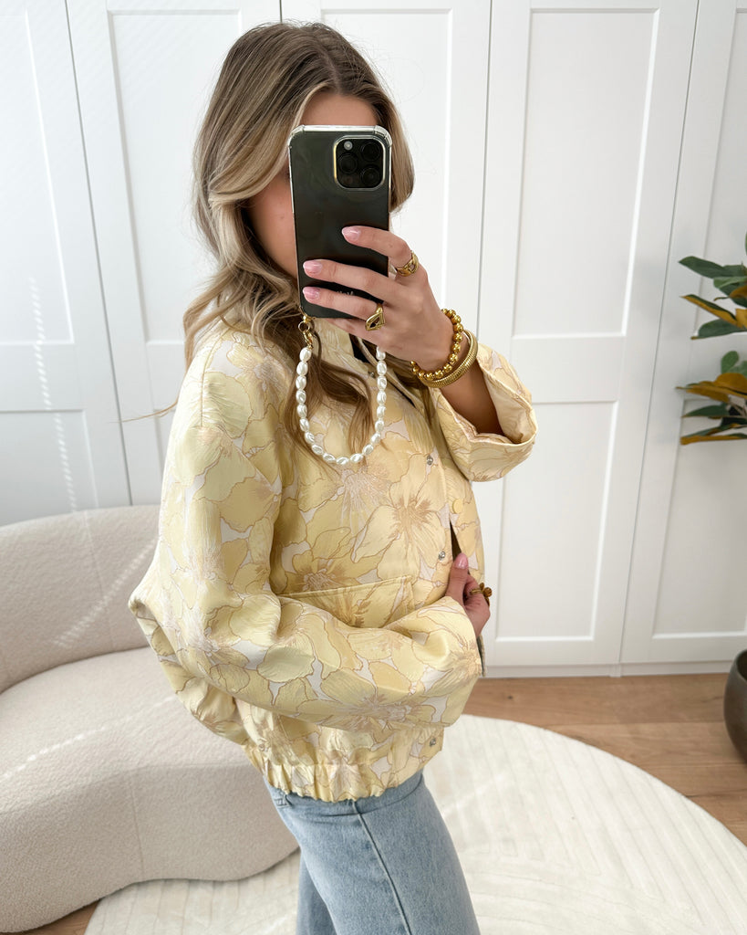 Gele bomber jas met bloemen patroon