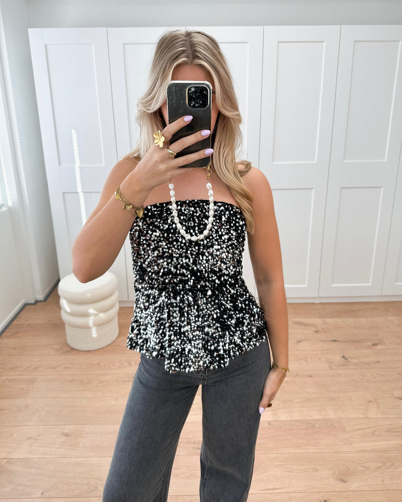 Zwart/zilver mouwloze peplum top met glitters