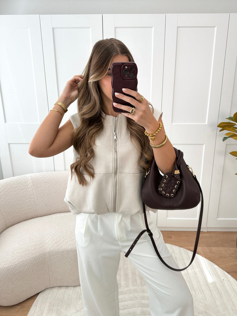 Creme suede gilet met zilveren ritssluiting