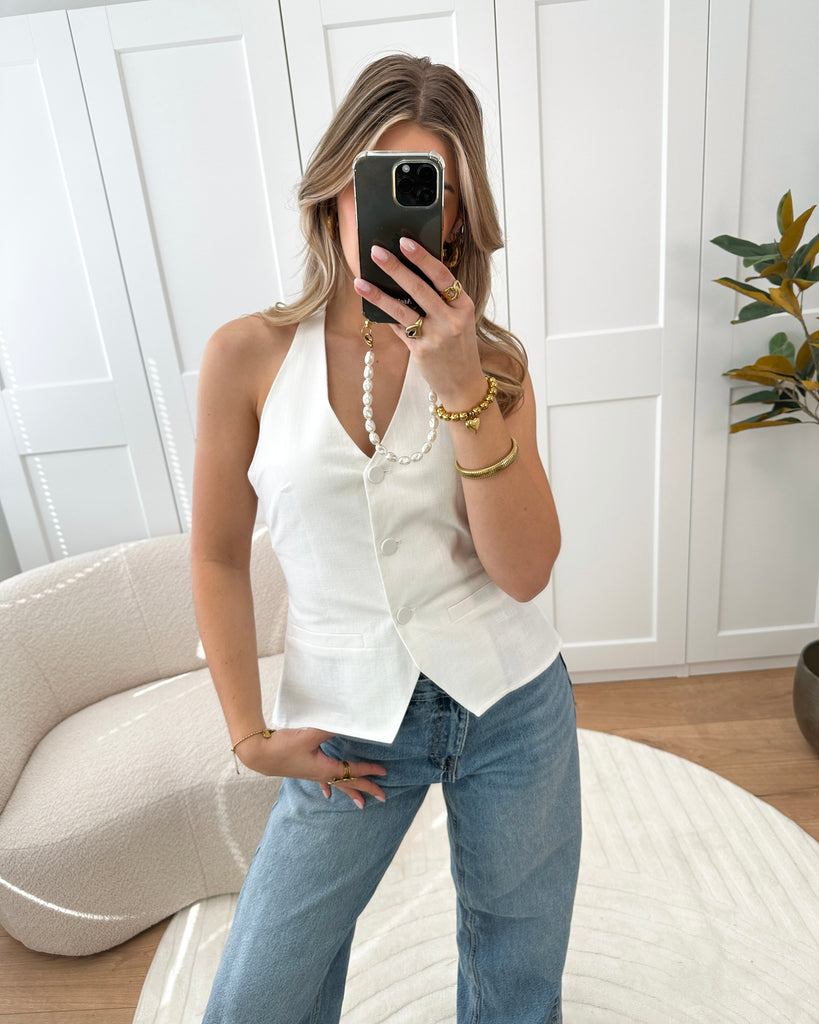 Witte linnen look gilet met knoopsluiting en open rug met strik in de nek en op de rug