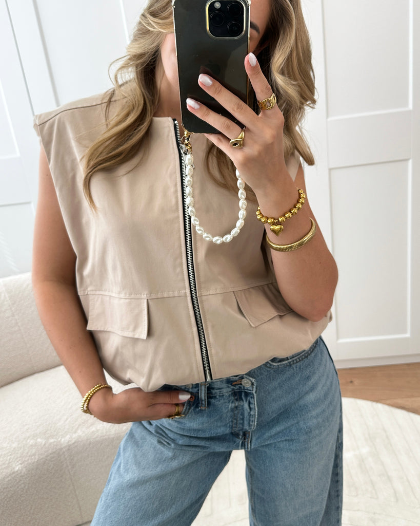 Beige cargo gilet met zakken en zilveren ritssluiting