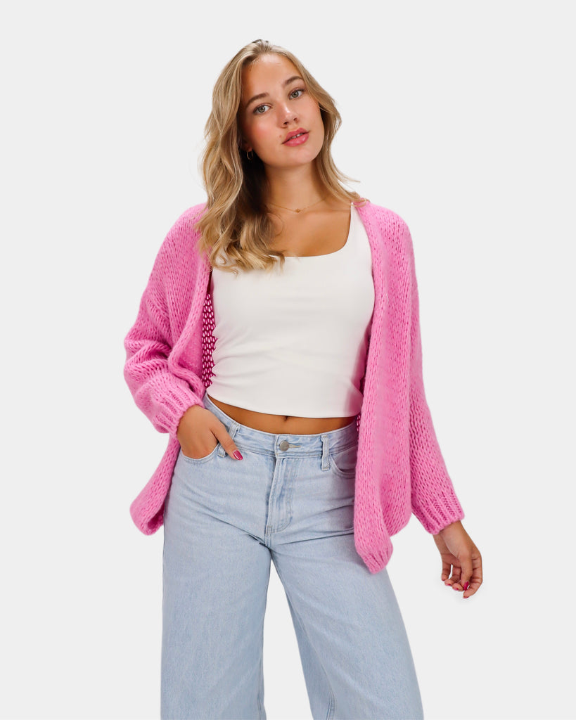Roze gebreide wollen vest