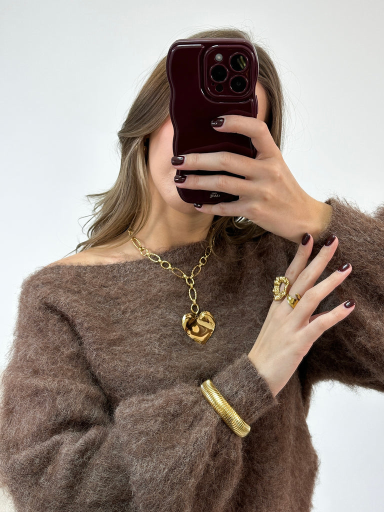 Gouden schakelketting met groot hart