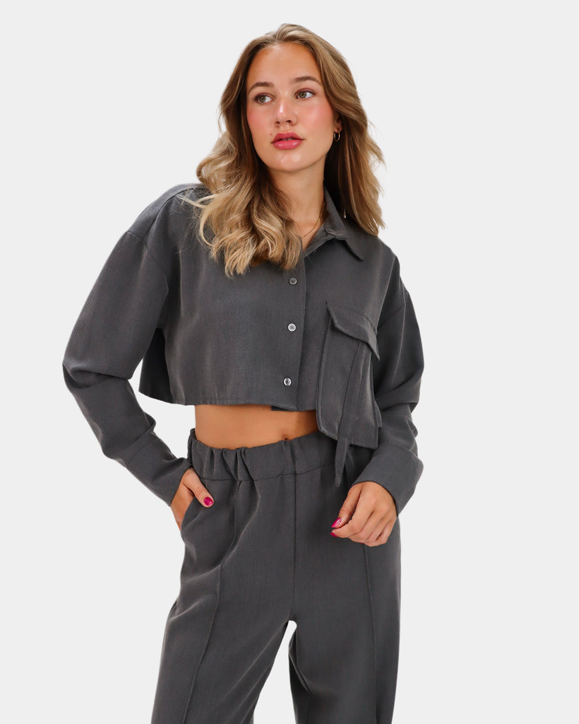 Grijze set met pantalon en blouse