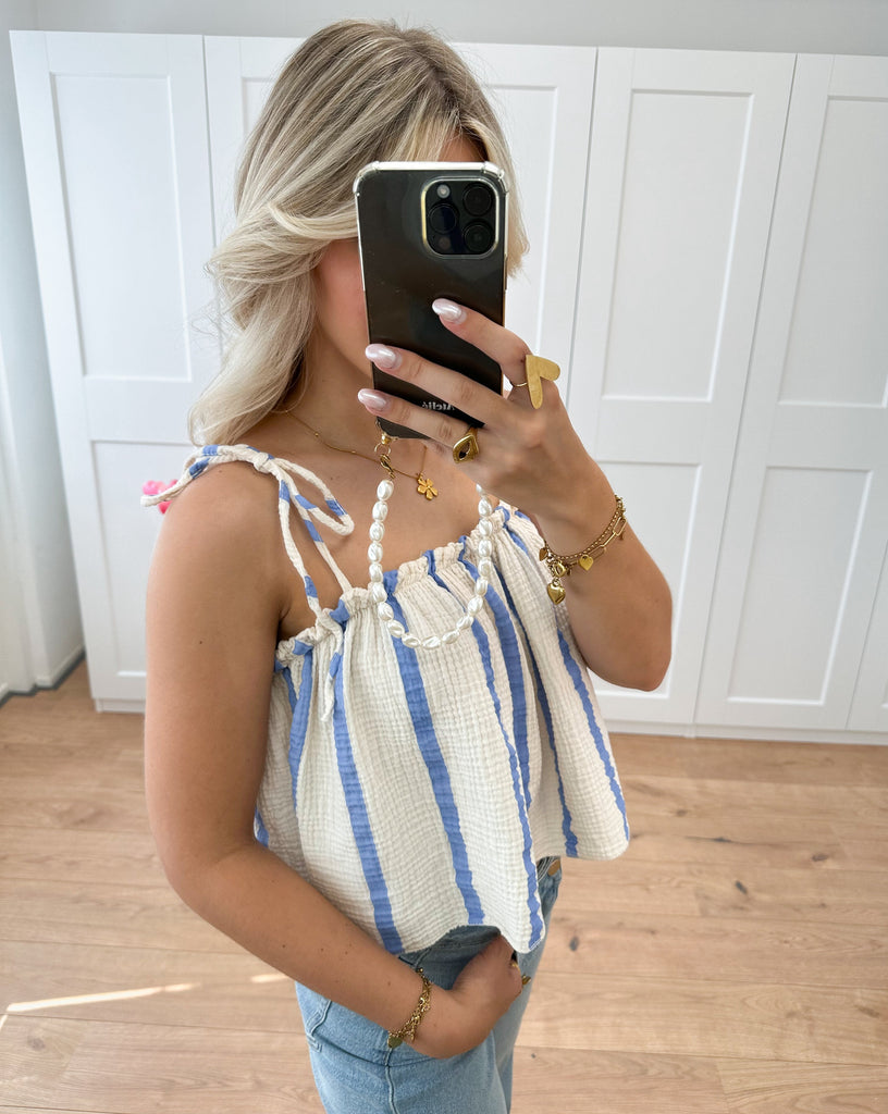 Top met strik detail op de schouders beige met blauw