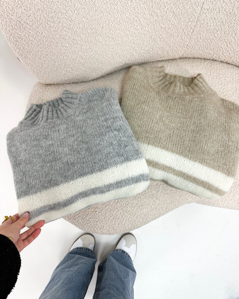 Taupe/bruine trui met witte strepen