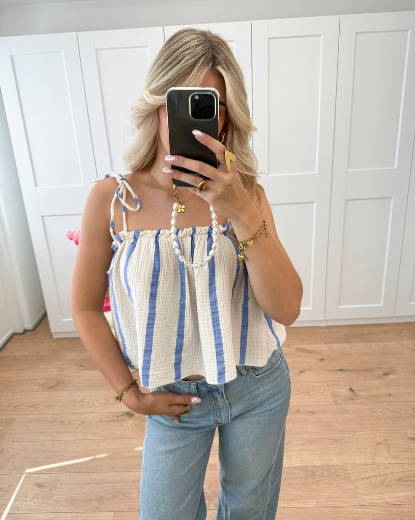 Top met strik detail op de schouders beige met blauw