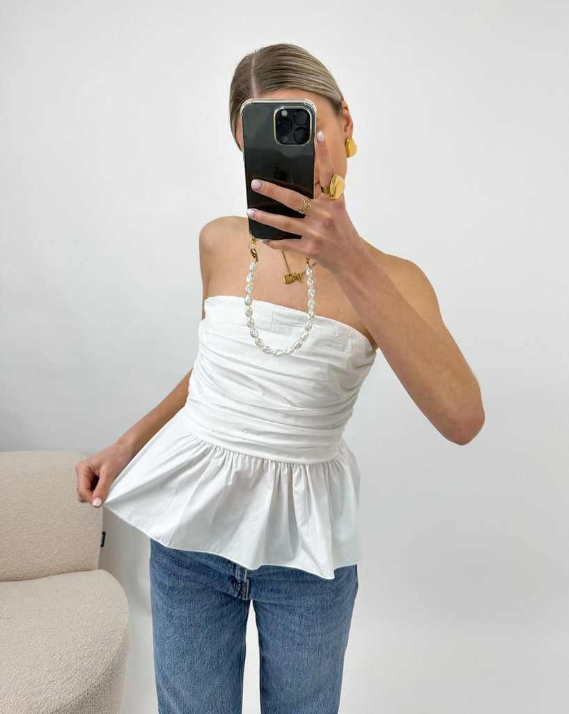 Witte katoenen peplum top