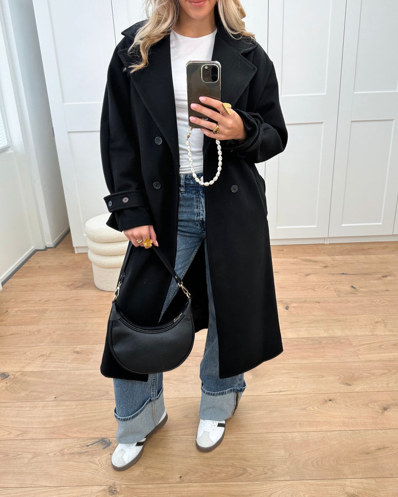 Zwarte lange trench coat met knoop sluiting en strik detail