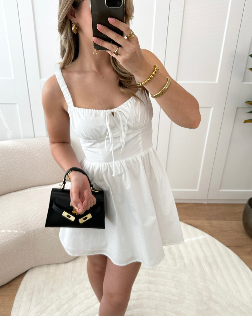 Wit katoenen corset jurkje met strik detail