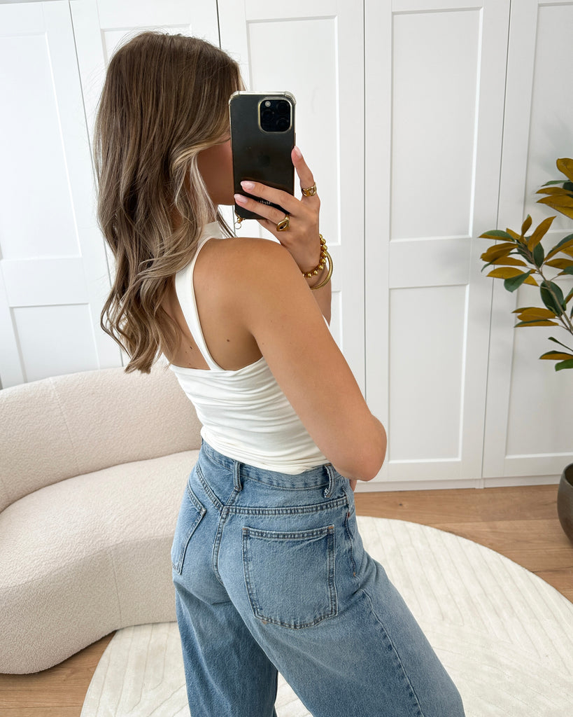 Creme bandeau top met choker hals