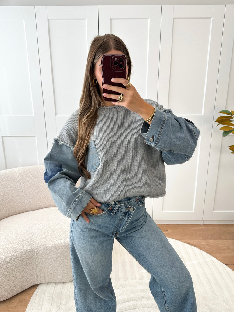 Grijze sweater met denim mouwen
