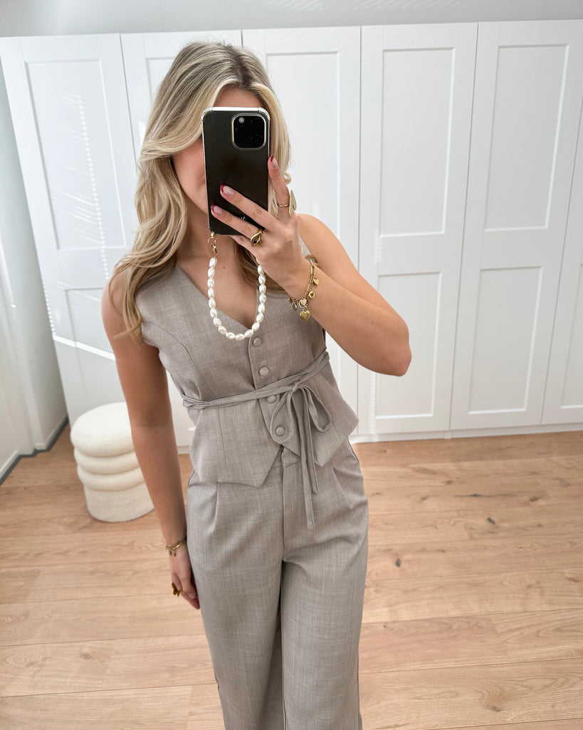 Taupe/bruine gilet met strikje